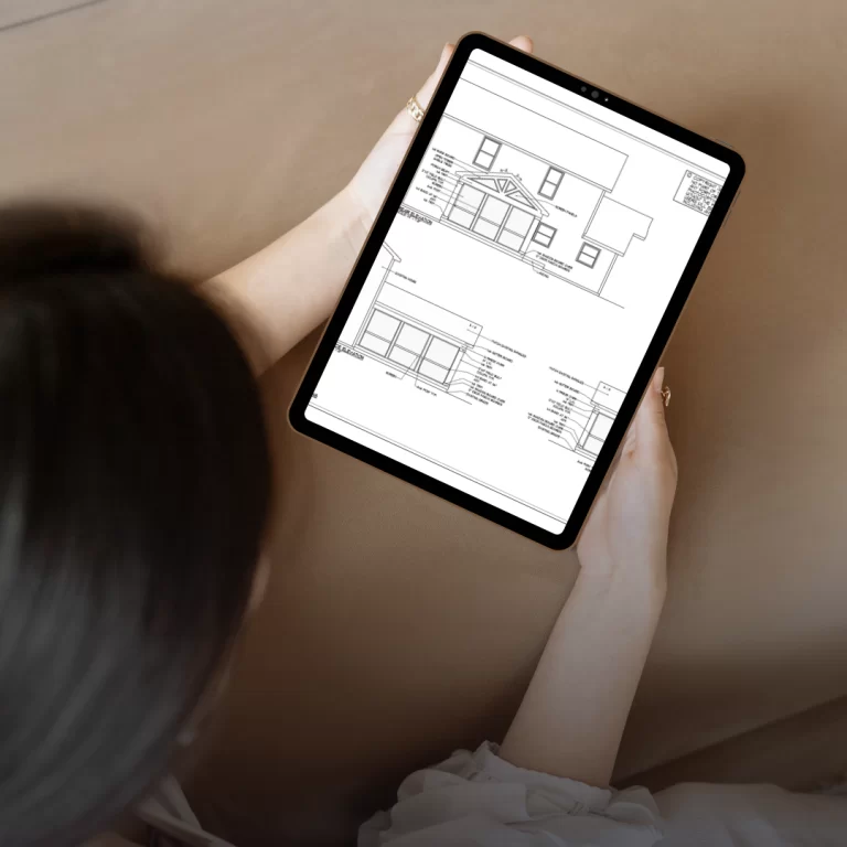 Tablet displaying detailed home construction blueprints — representing Ntegrity Builders’ design and project planning process in Carmel, Indiana.