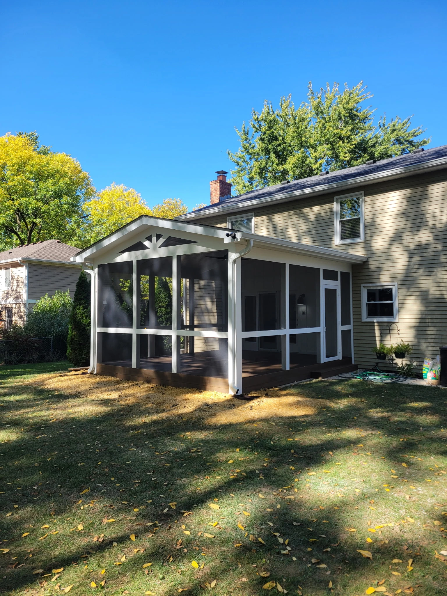 Ntegrity Builders covered porch addition with Trex composite decking in Central Indiana