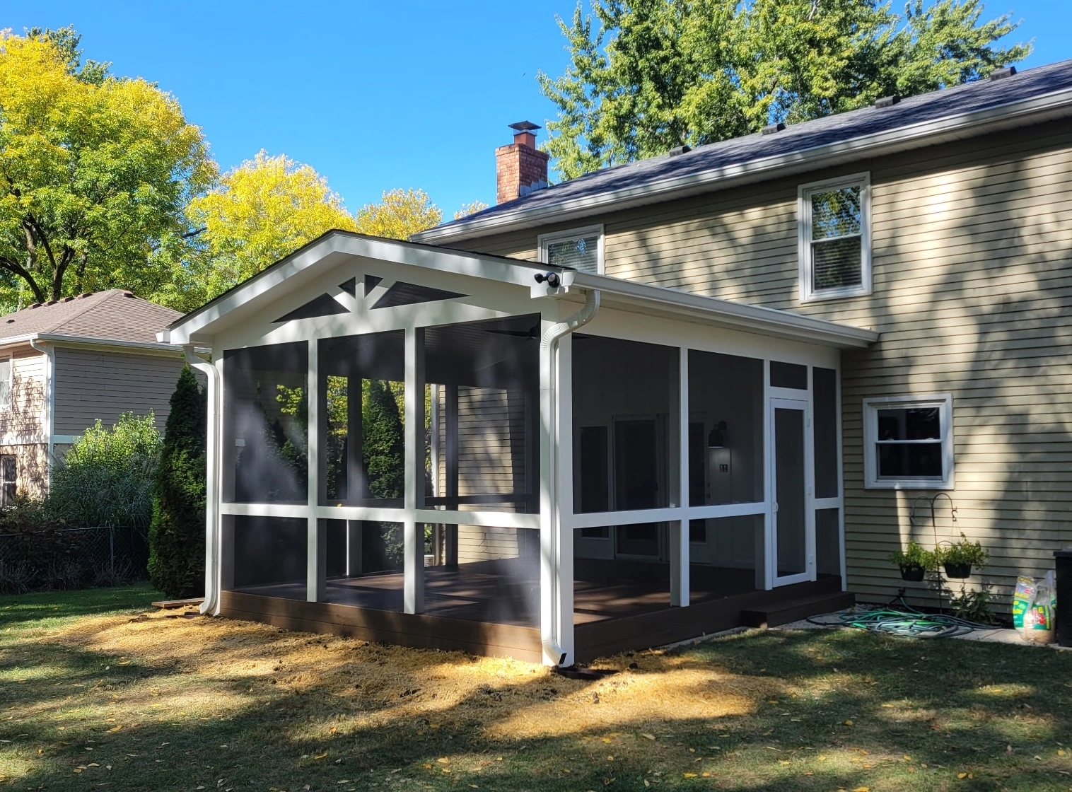 Finished screened porch home addition attached to an existing Central Indiana home