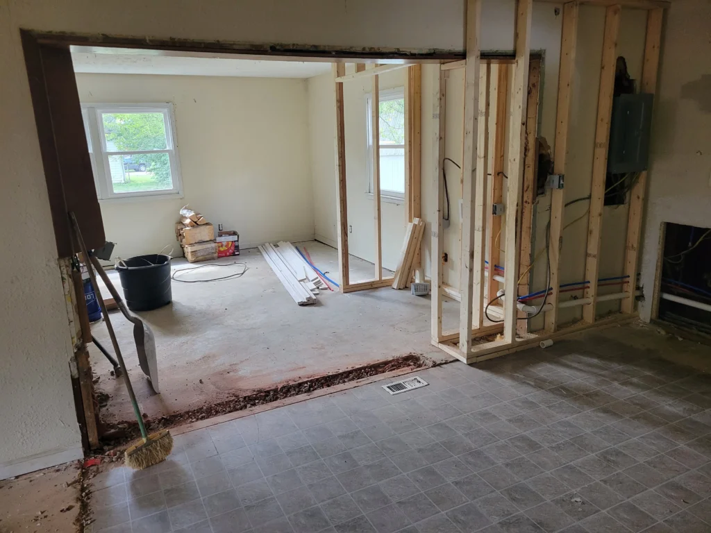 In-progress remodeling work with framing, rough-ins, and open walls in Central Indiana
