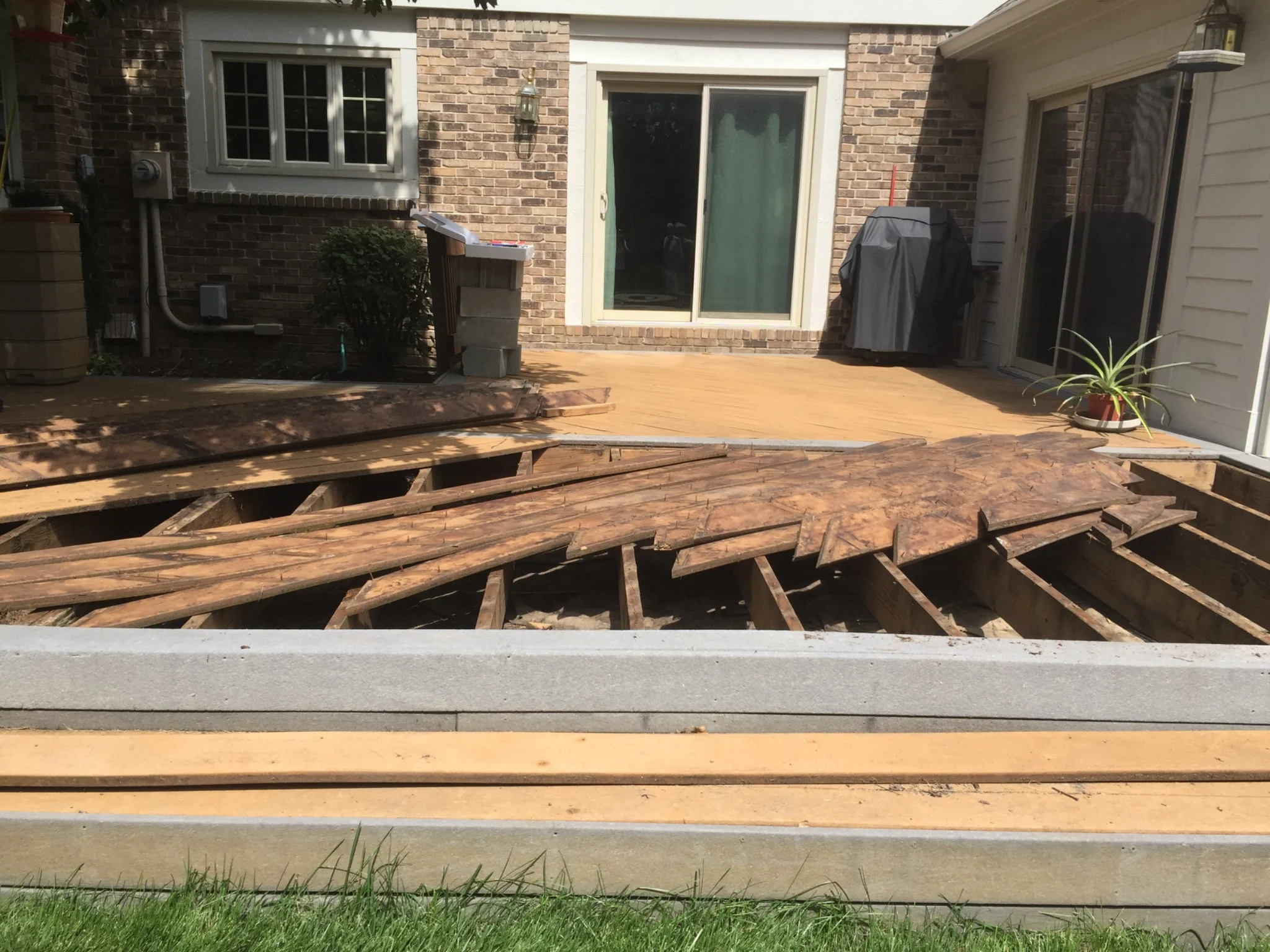 Existing composite deck during demolition before replacement in Carmel Indiana