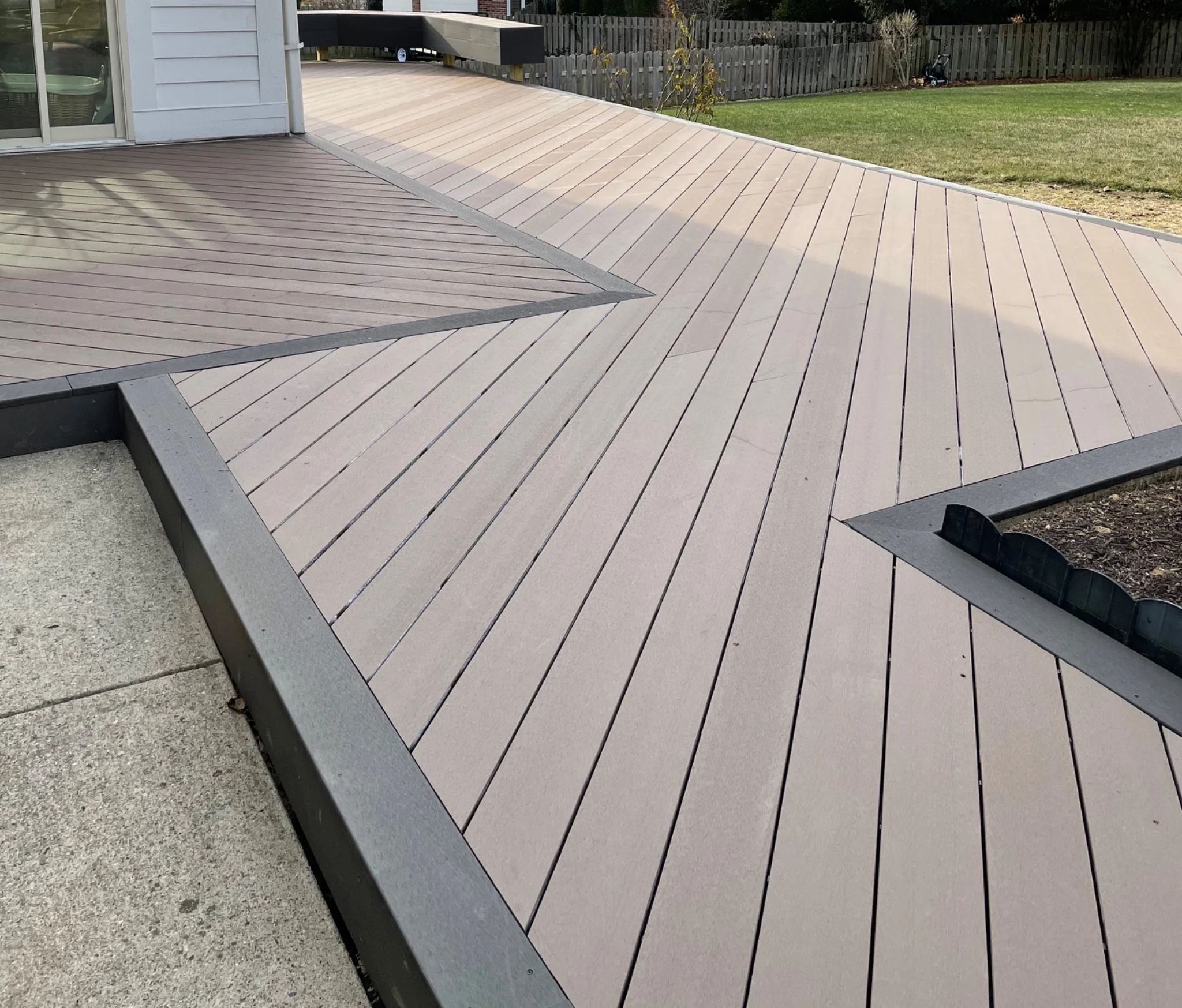 Cali Bamboo composite deck with diagonal board pattern and contrasting picture-frame border in Carmel, Indiana