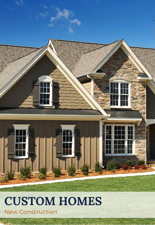 Custom home exterior with mixed siding, stone accents, multiple rooflines, and landscaped front yard