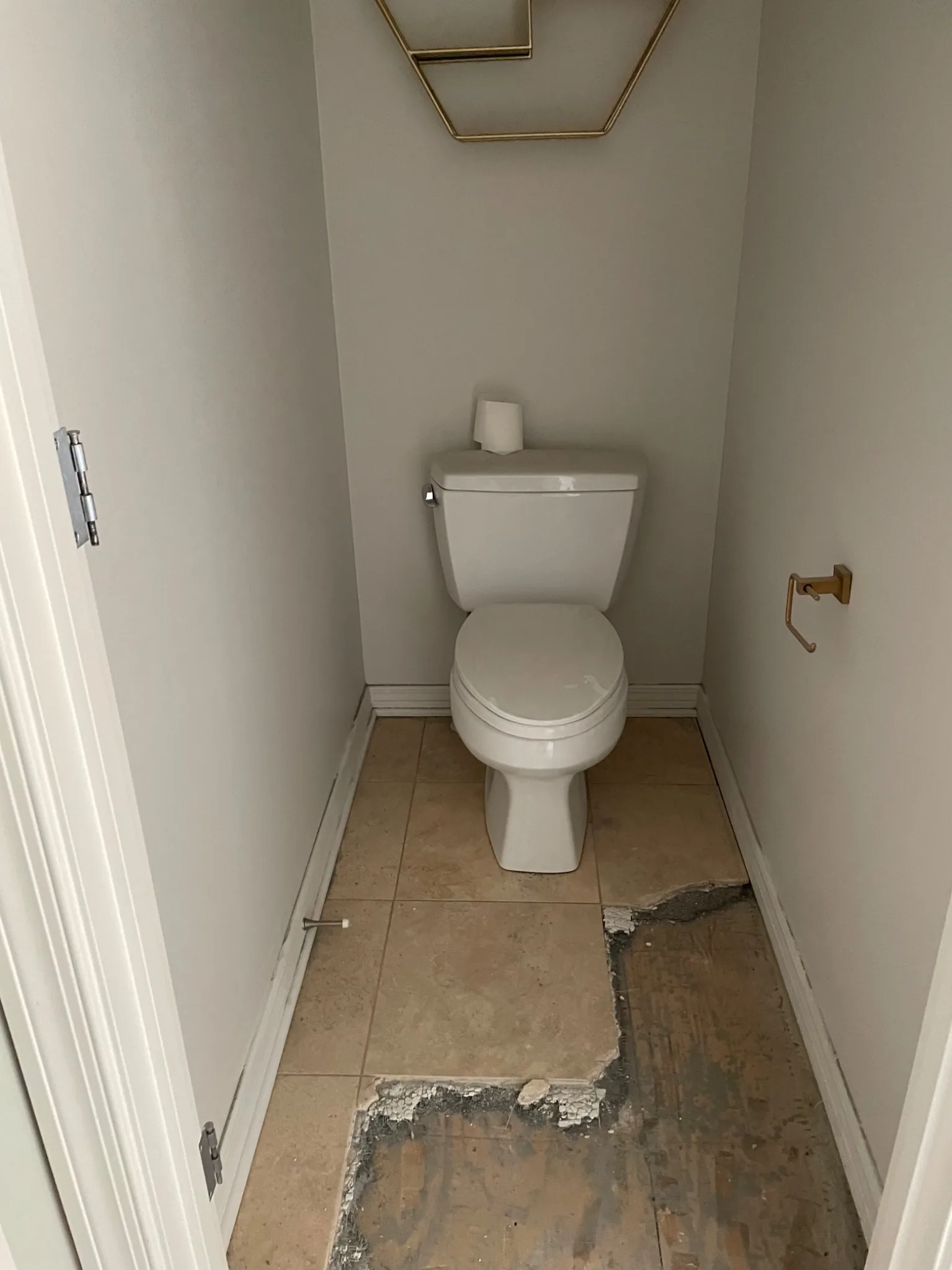 Water damage exposed in the primary bathroom water closet during remodeling in Carmel Indiana