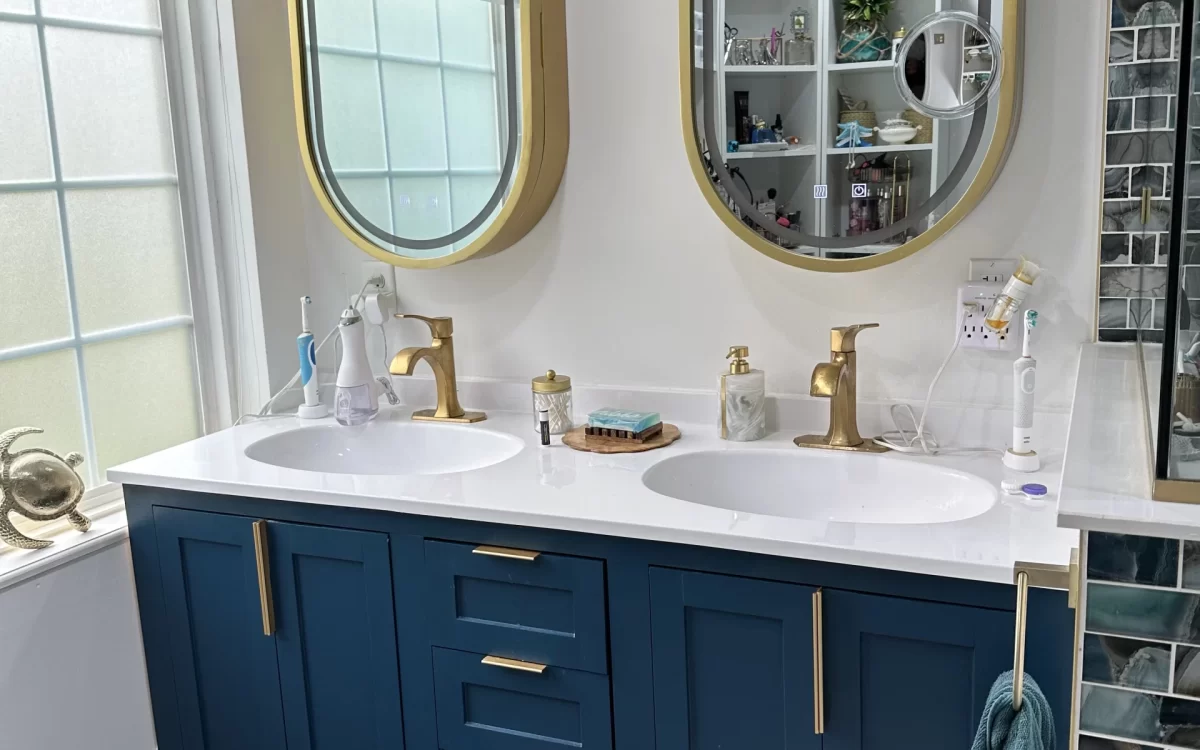 Detail of vanity and tile finishes in completed Carmel master bathroom remodel